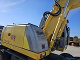 <b>NEW-HOLLAND</b> MH Plus Wheel-Type Excavator