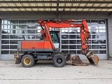 NEW-HOLLAND MH Plus Wheel-Type Excavator