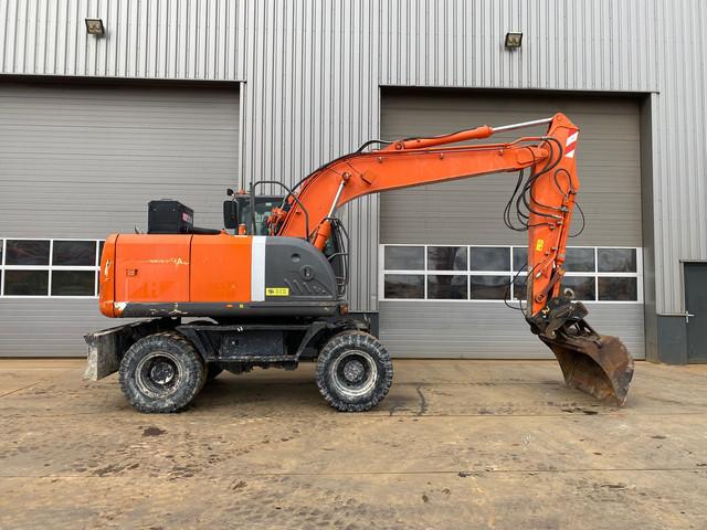 HITACHI ZX 140 W 3 wheel-type excavator