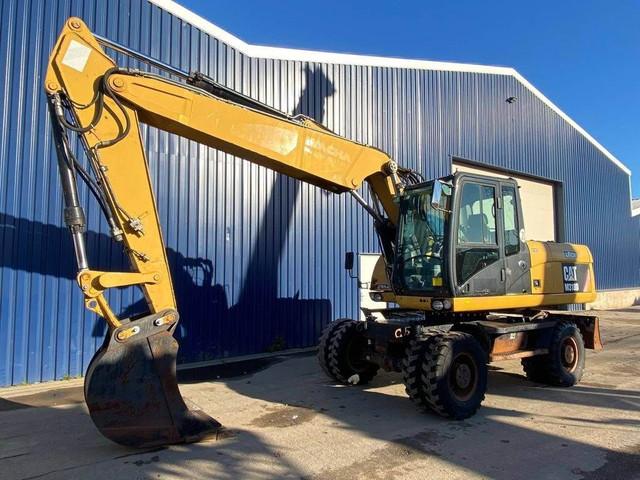 CATERPILLAR M318D wheel-type excavator