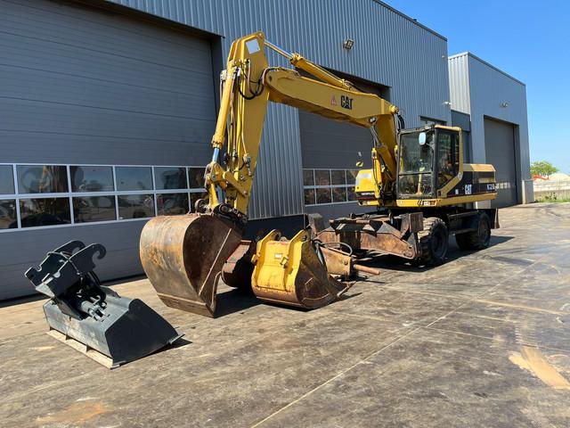 CATERPILLAR M320F wheel-type excavator