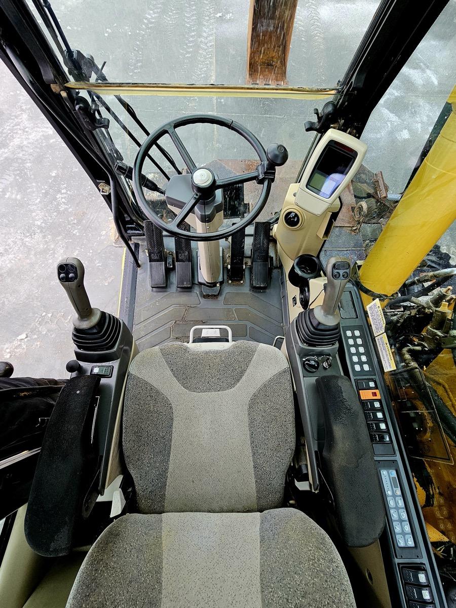 CATERPILLAR M316C wheel-type excavator