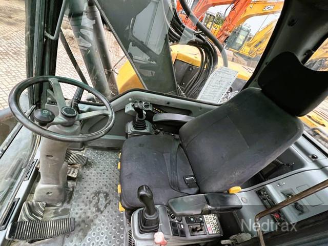 VOLVO EW140B wheel-type excavator