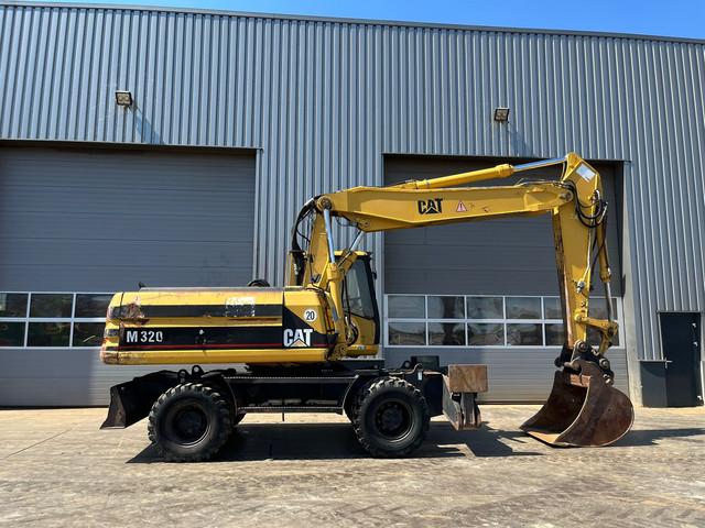 CATERPILLAR M320F wheel-type excavator