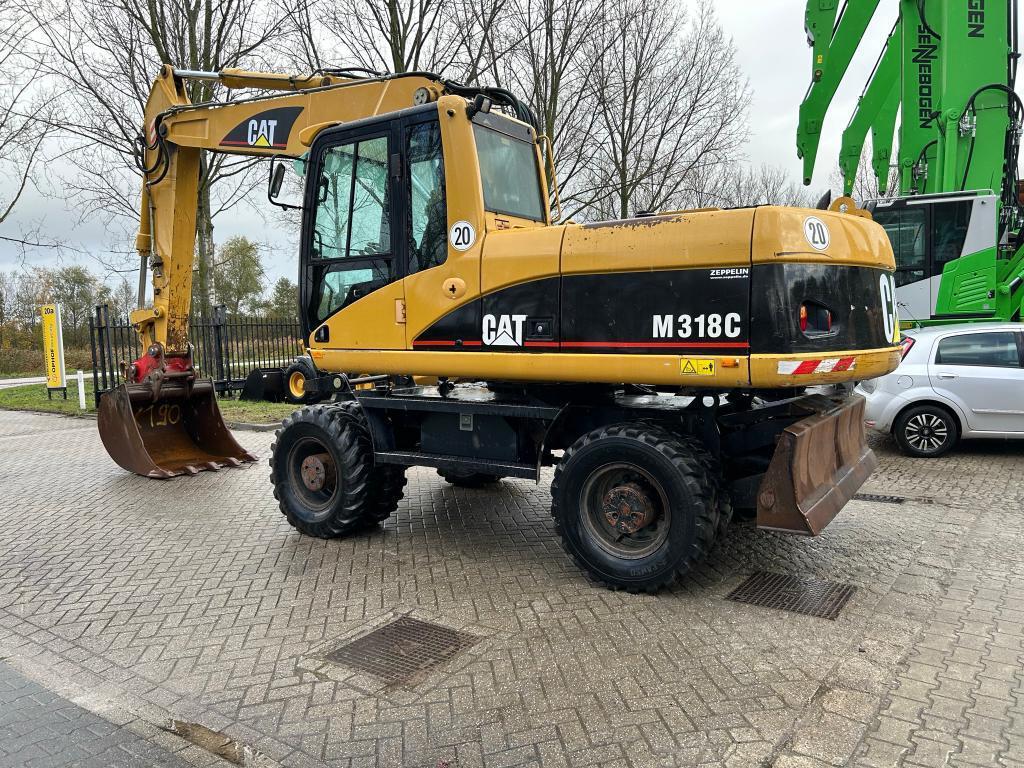 CATERPILLAR M318C wheel-type excavator