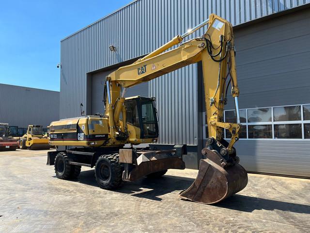 CATERPILLAR M320F wheel-type excavator