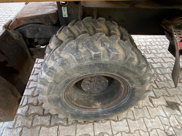 CATERPILLAR M320F wheel-type excavator