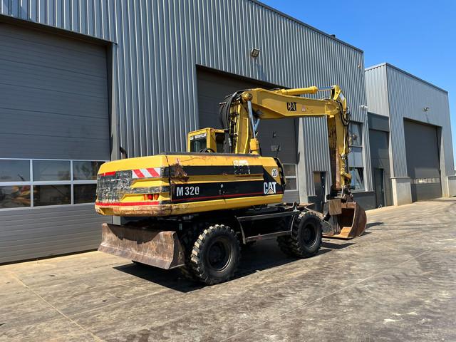 CATERPILLAR M320F wheel-type excavator