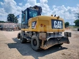 CATERPILLAR M313D wheel-type excavator