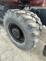 CATERPILLAR M316D wheel-type excavator