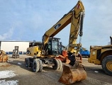 CATERPILLAR M318D wheel-type excavator