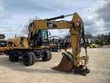 CATERPILLAR M318D wheel-type excavator