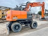 HITACHI ZX 140 W 3 wheel-type excavator