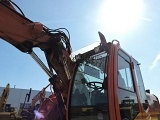 HITACHI ZX 140 W 5 wheel-type excavator