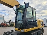 CATERPILLAR M318D wheel-type excavator