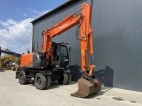 HITACHI ZX 140 W 5 wheel-type excavator