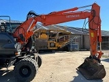 HITACHI ZX 140 W 3 wheel-type excavator