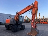 HITACHI ZX 140 W 3 wheel-type excavator