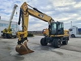 CATERPILLAR M318D wheel-type excavator