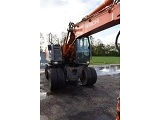 HITACHI ZX 140 W 3 wheel-type excavator