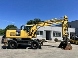 KOMATSU PW180-7E0 wheel-type excavator