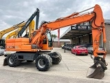 DOOSAN DX 140 W wheel-type excavator