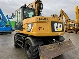 CATERPILLAR M313D wheel-type excavator