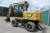 CATERPILLAR M313D wheel-type excavator