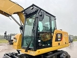 CATERPILLAR M320F wheel-type excavator