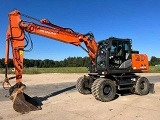 HITACHI ZX 140 W 3 wheel-type excavator