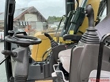 CATERPILLAR M320F wheel-type excavator