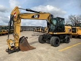 CATERPILLAR M318D wheel-type excavator