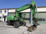 CATERPILLAR M322D wheel-type excavator