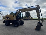 CATERPILLAR M313D wheel-type excavator