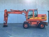 HITACHI ZX 140 W 3 wheel-type excavator