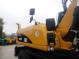 CATERPILLAR M322D wheel-type excavator