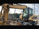 CATERPILLAR M316C wheel-type excavator