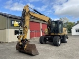 CATERPILLAR M313D wheel-type excavator