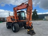 DOOSAN DX 140 W wheel-type excavator