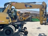 CATERPILLAR M316 wheel-type excavator