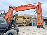 HITACHI ZX 140 W 3 wheel-type excavator