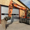 DOOSAN DX 140 W wheel-type excavator