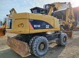 CATERPILLAR M318D wheel-type excavator