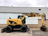 CATERPILLAR M313D wheel-type excavator