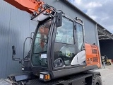 HITACHI ZX 140 W 5 wheel-type excavator