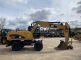 CATERPILLAR M318D wheel-type excavator