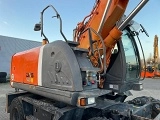 HITACHI ZX 140 W 3 wheel-type excavator