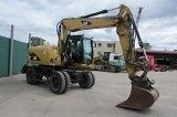 CATERPILLAR M313D wheel-type excavator