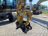 CATERPILLAR M318D wheel-type excavator