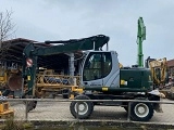 NEW-HOLLAND MH Plus wheel-type excavator
